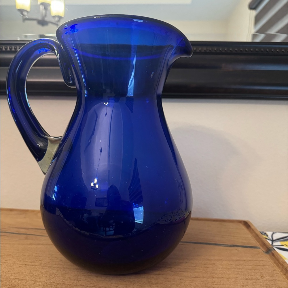 Beautiful crafted; Mexican hand blown glass pitcher.